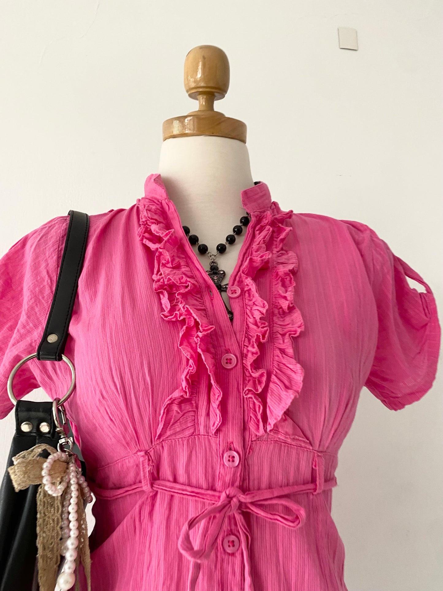 Pink top with bow