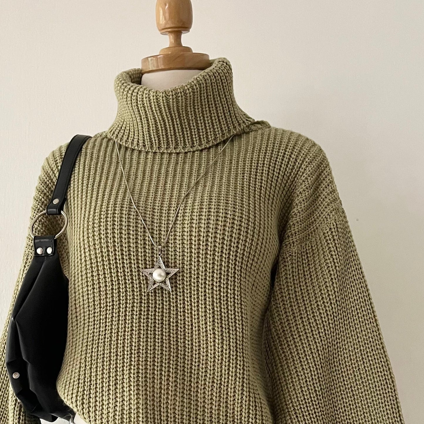 High-neck sweater with wide sleeves
