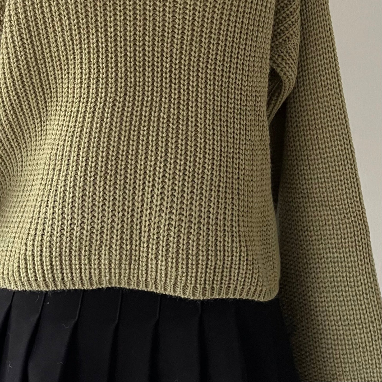 High-neck sweater with wide sleeves