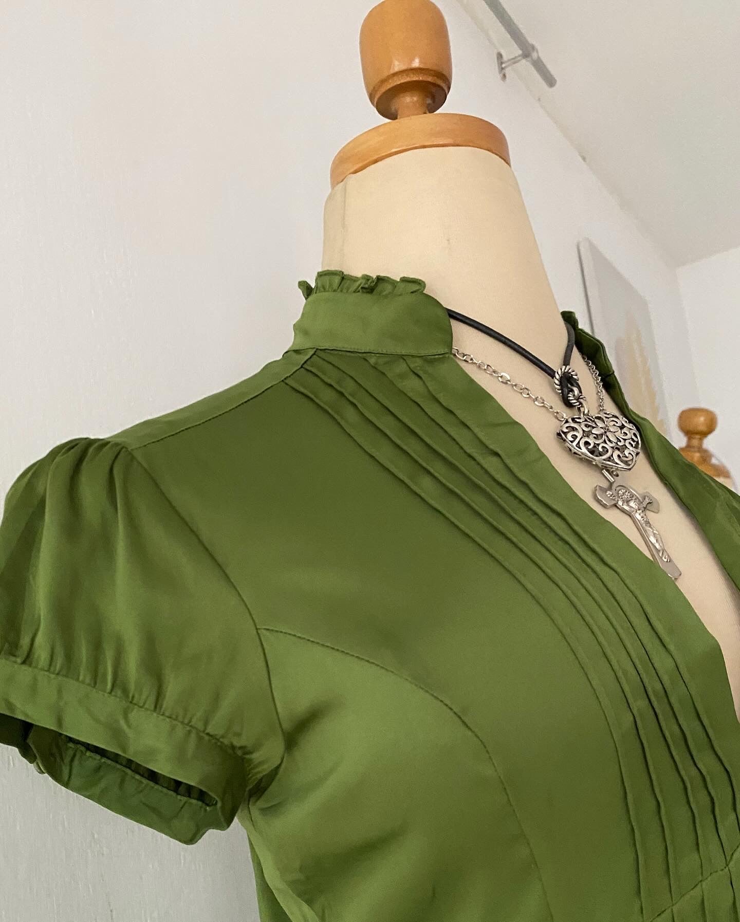 Green satin blouse