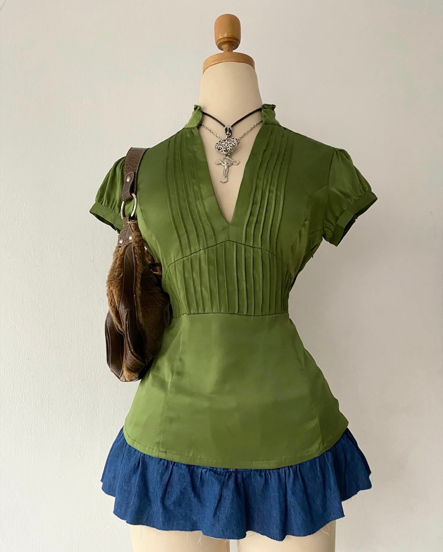 Green satin blouse