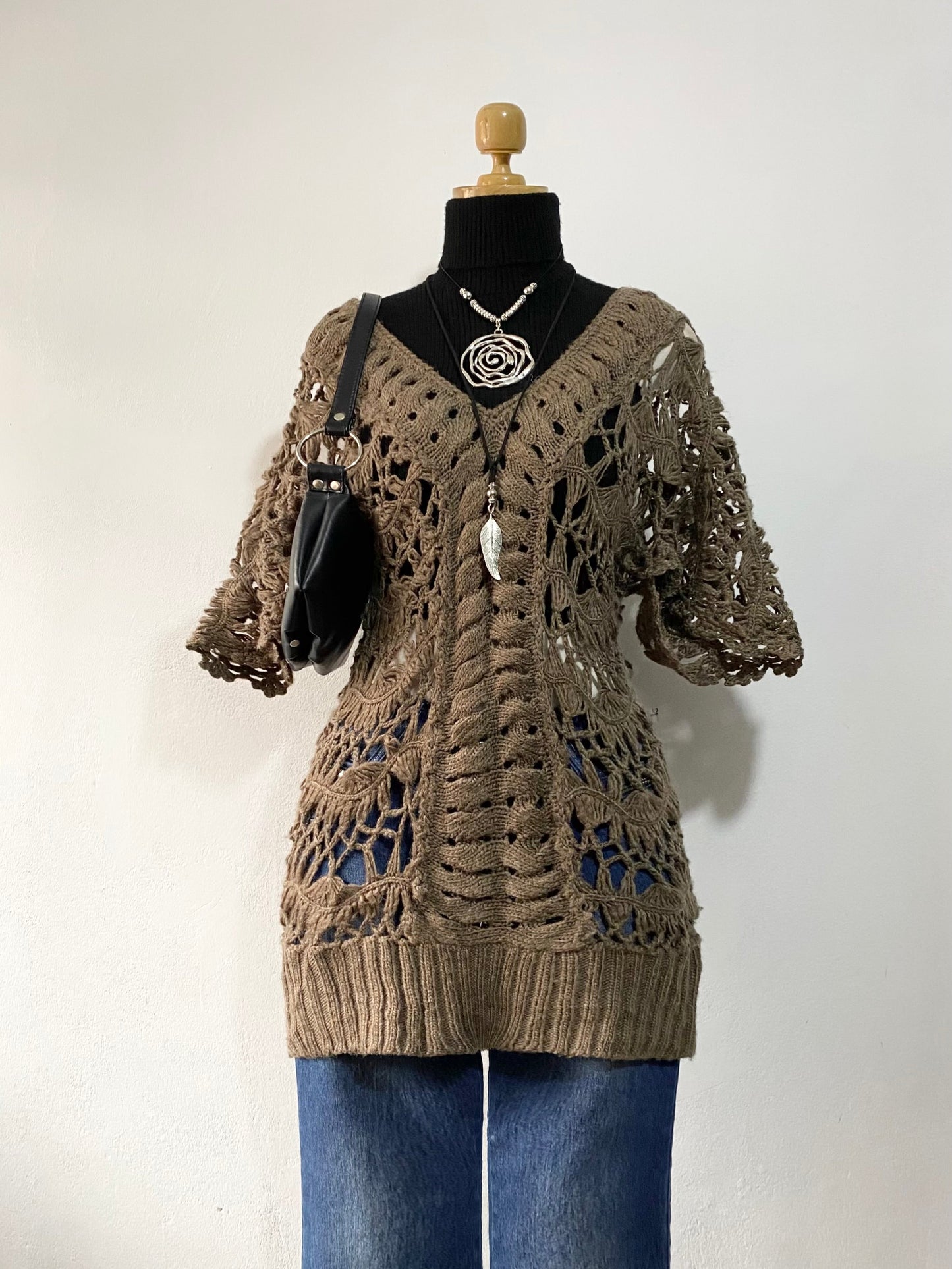 Knitted long sweater