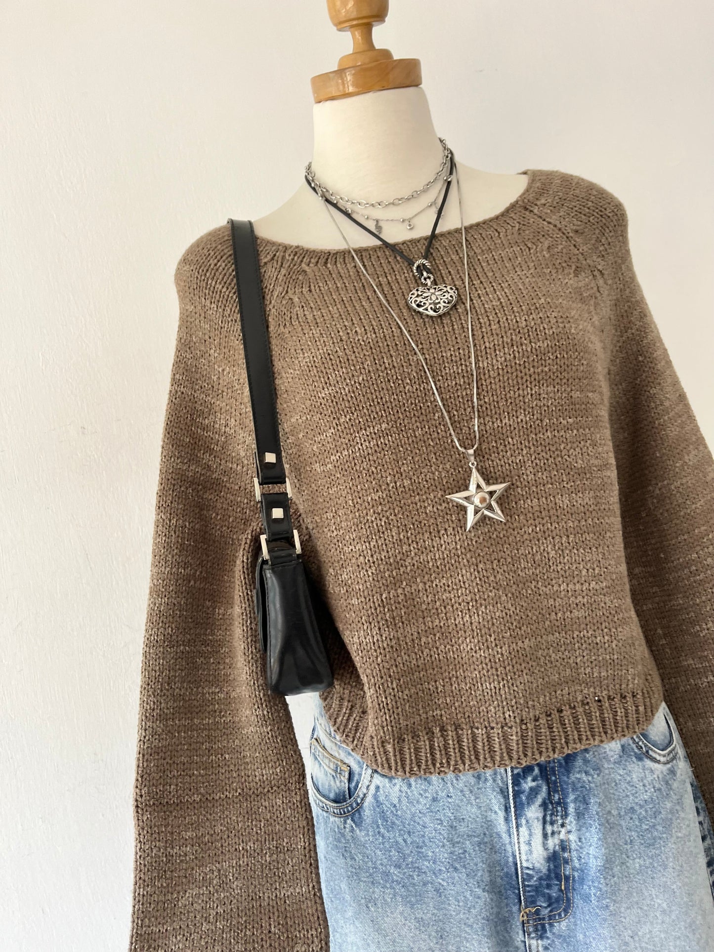 Waist-length sweater with straight sleeves