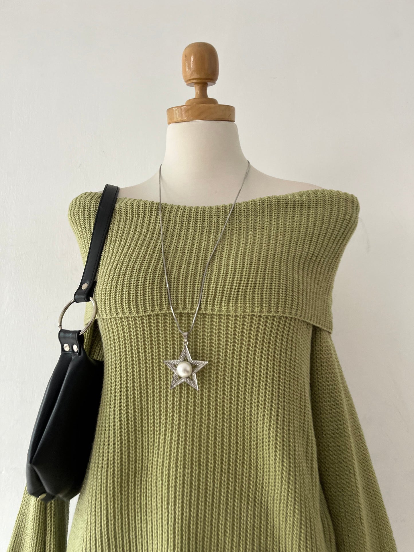 Oversized olive green sweater with flared sleeves