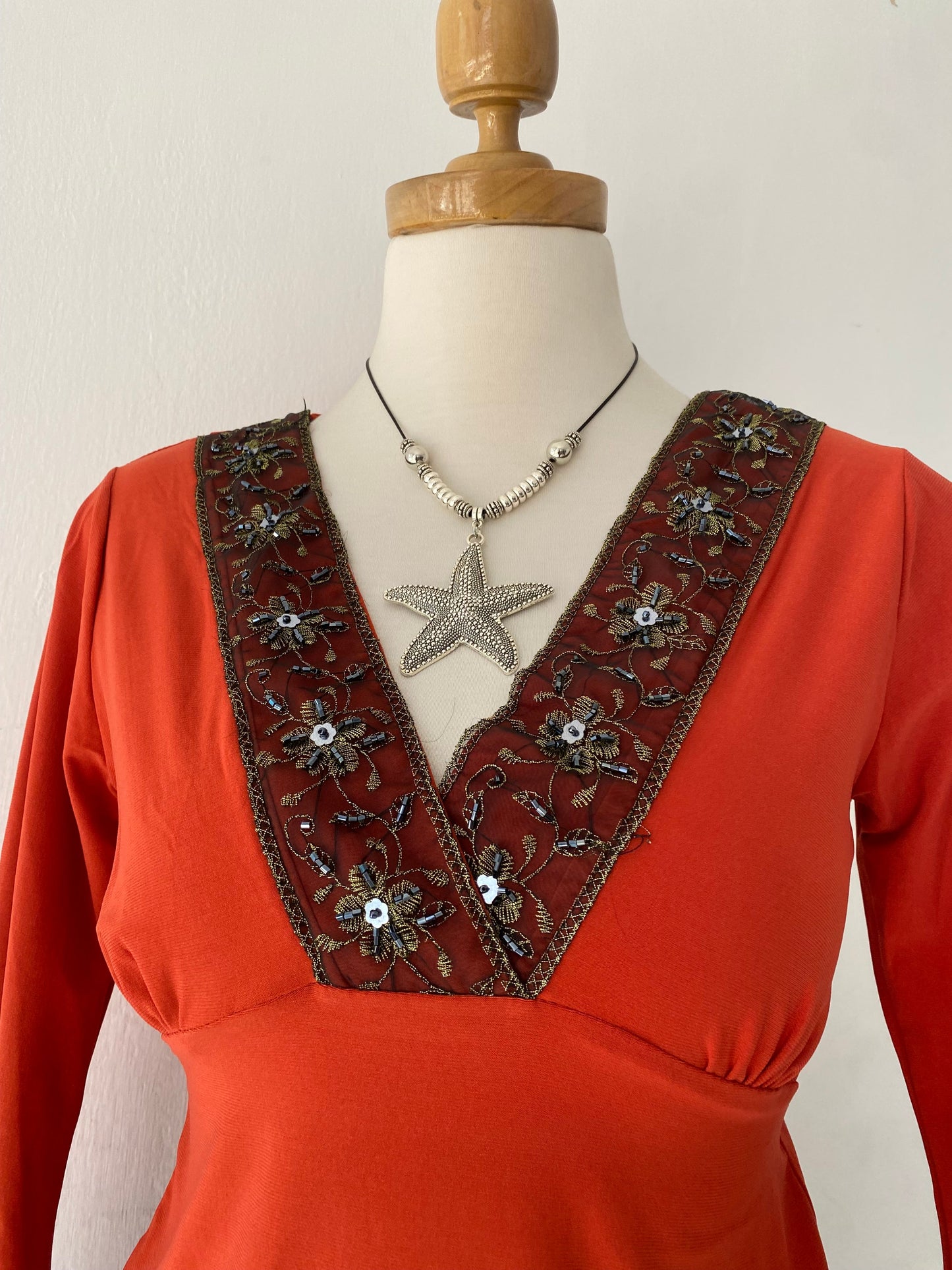 Bell-sleeved top