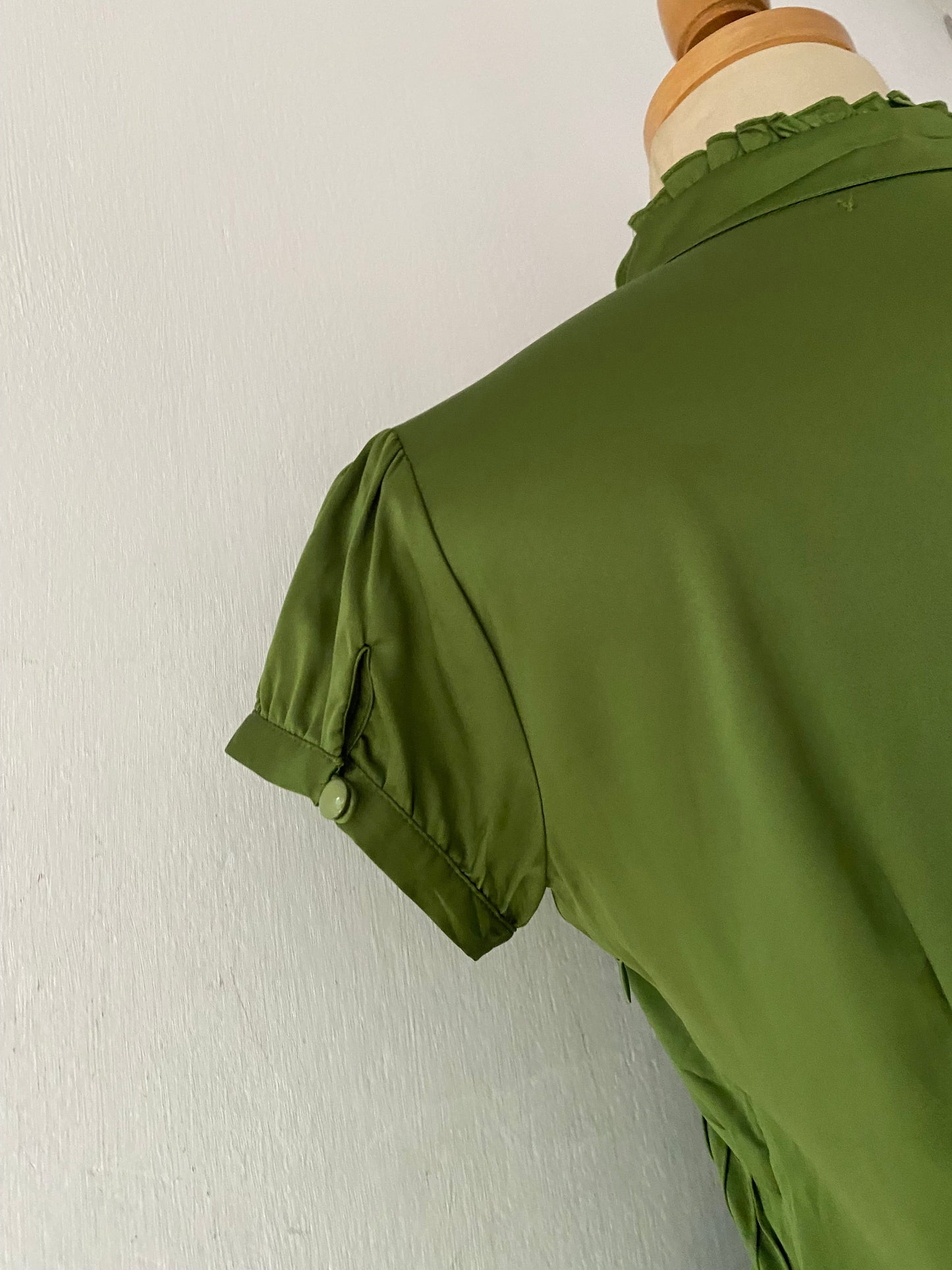 Green satin blouse