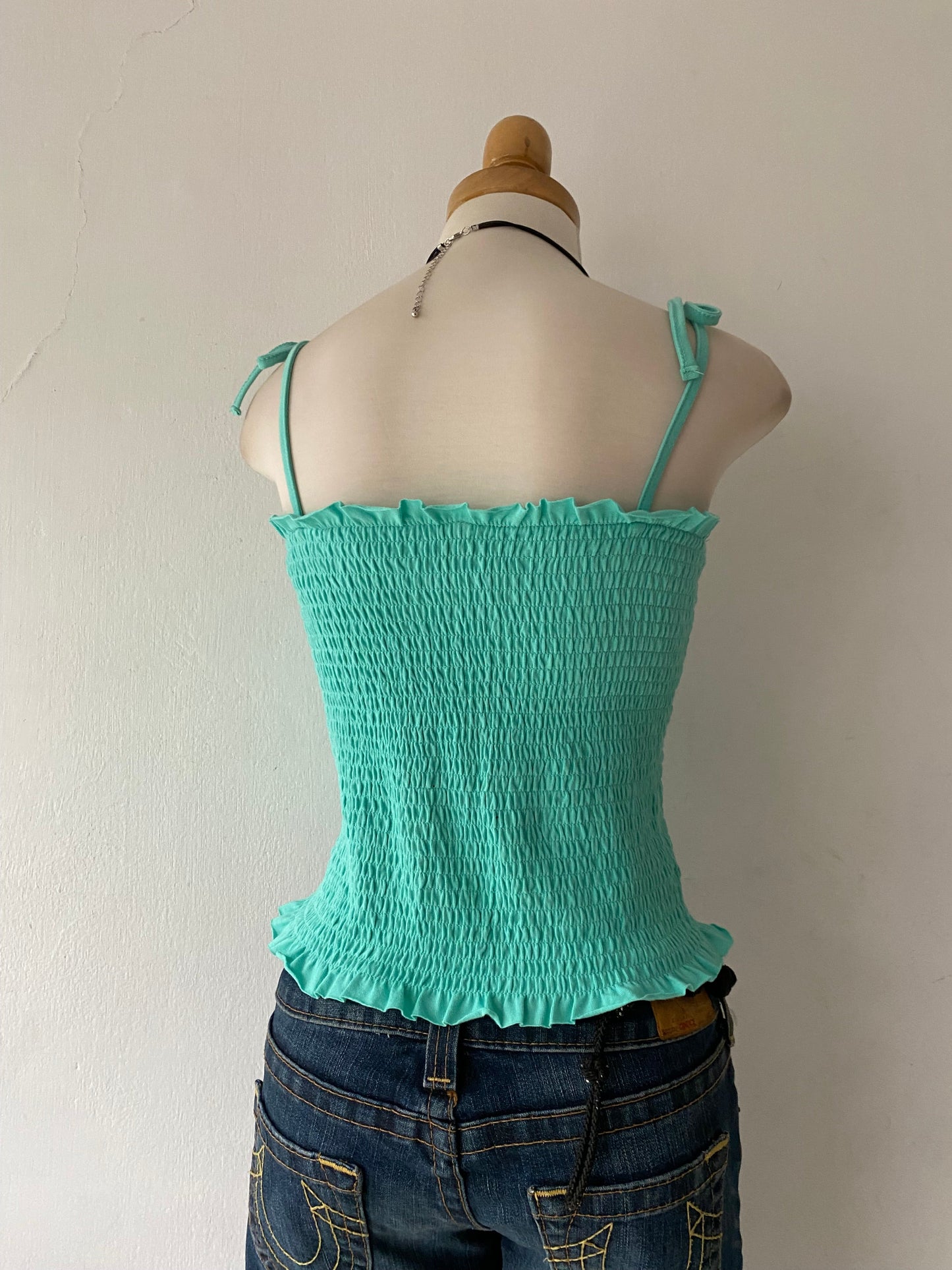 Jade green top with bows