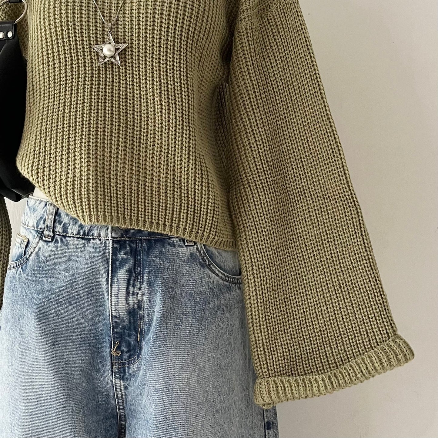 High-neck sweater with wide sleeves