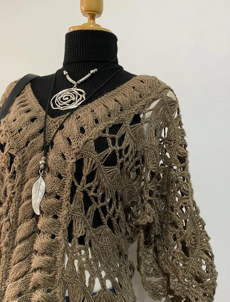 Knitted long sweater