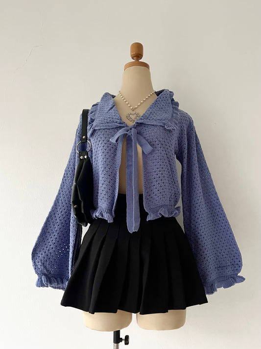 Knitted cardigan with bow