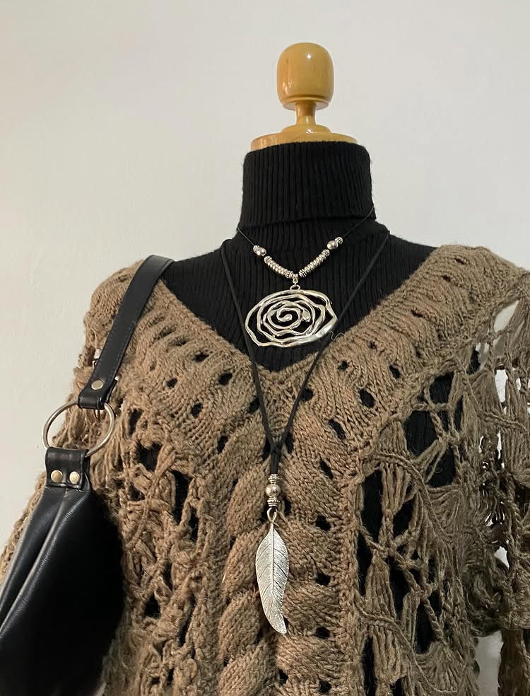 Knitted long sweater