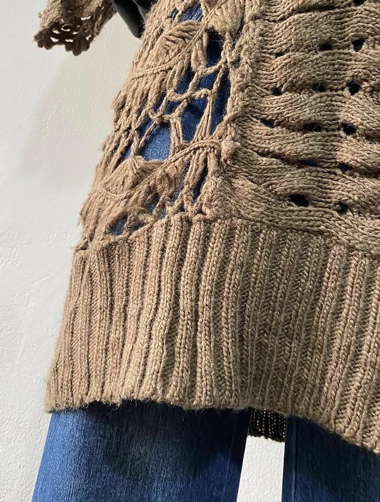 Knitted long sweater