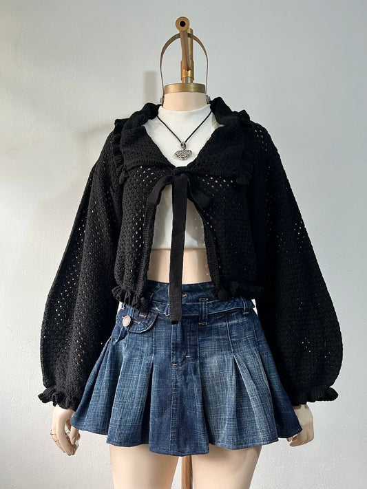 Knitted cardigan with bow